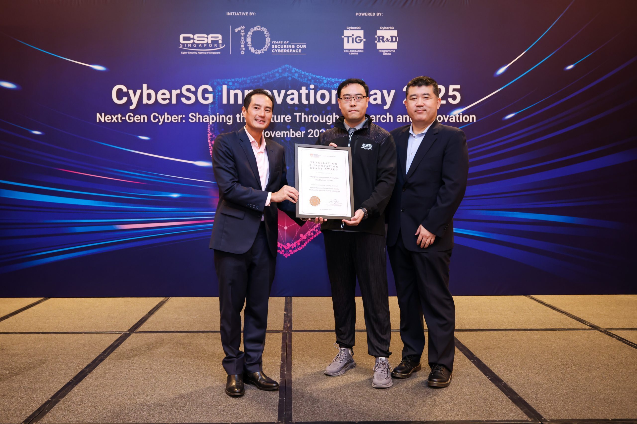 digiDations receiving the CRPO Grant certificate on stage at CyberSG Innovation Day 2025
