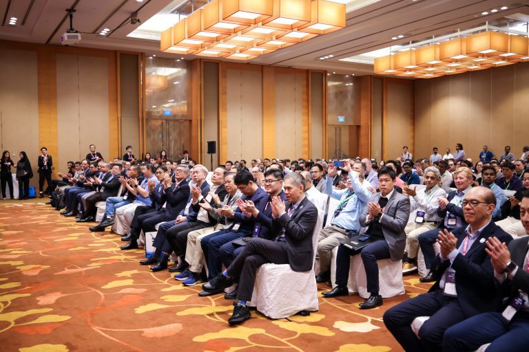 Seated audience applauding during the CyberSG Innovation Day 2025 ceremony
