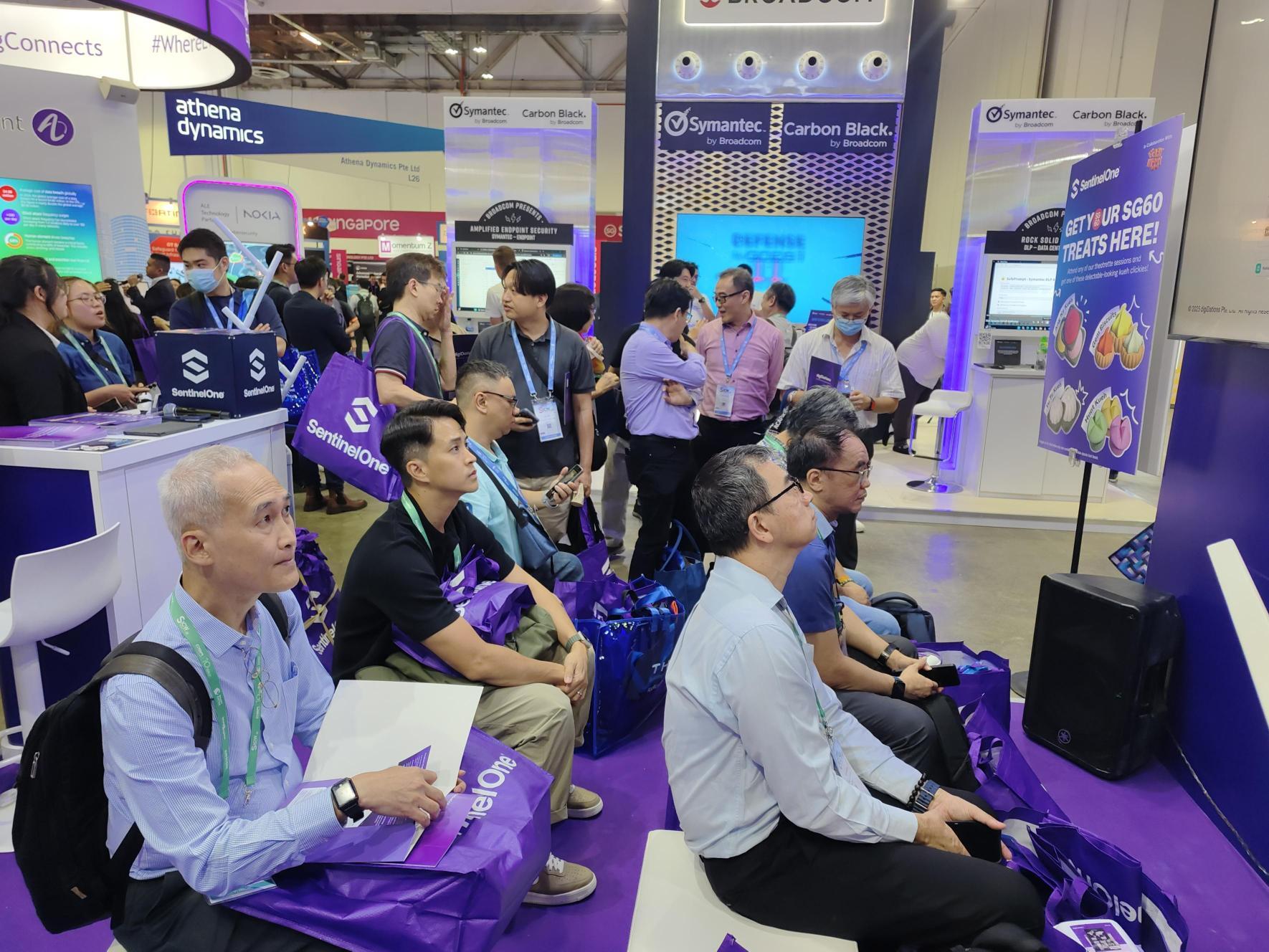 Attendees seated with digiDations tote bags at GovWare 2025